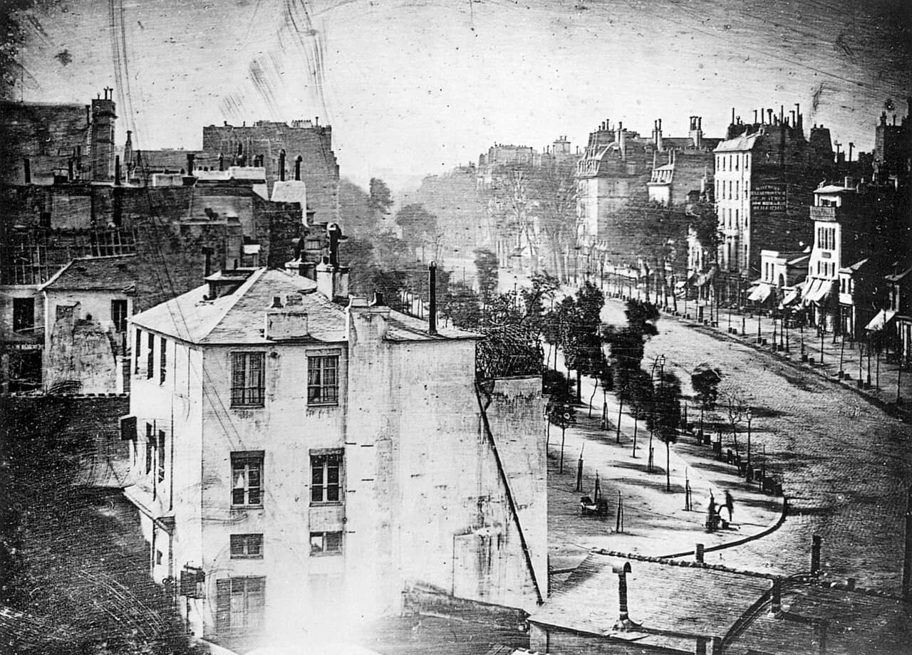 Daguerre's 1838 view of the Boulevard du Temple, containing the first photograph of a person